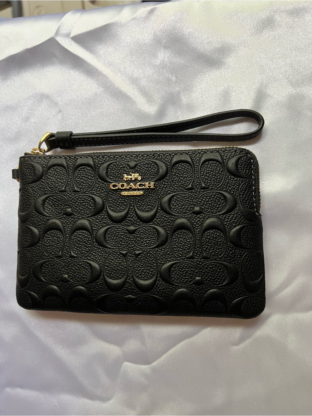 Coach Black Embossed Signature Wristlet with Gold Logo